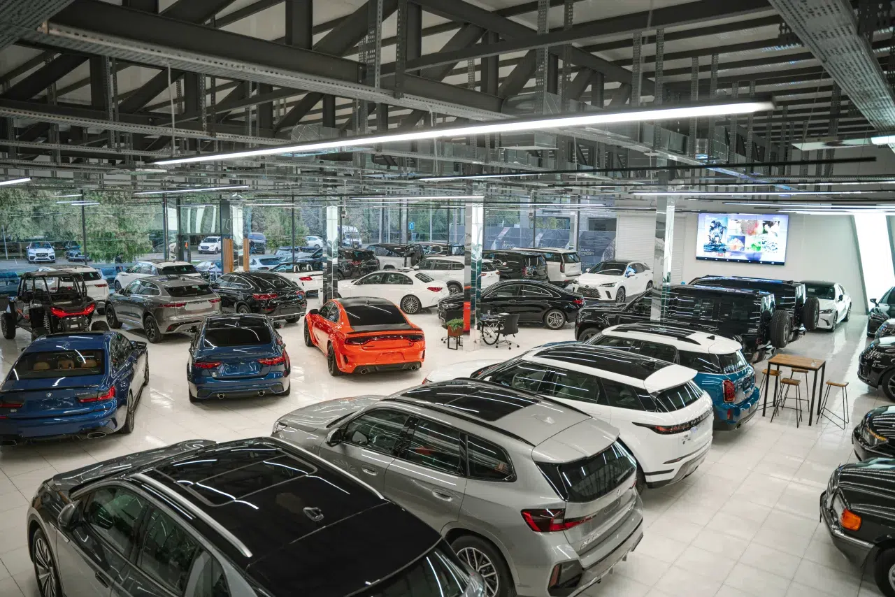 Cars displayed in a vehicle showroom for buyers with different budgets